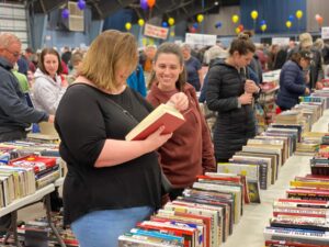 group of happy attendees at booksale